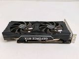 a close up of a video card on a white surface