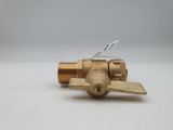 a brass ball valve on a white surface