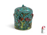 a blue and green container with a rooster design on it