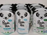 six sachets de thé au panda posés sur une table