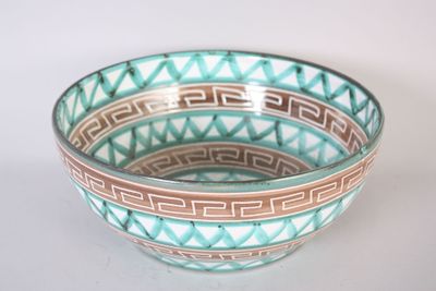 a bowl that is sitting on a white table