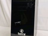 a black desktop computer sitting on a white surface