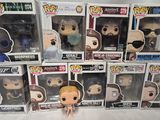 a lot of pop vinyl figures that are in the box