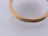 an image of a gold ring with a single diamond