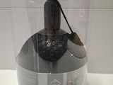 a plastic container that has a lamp inside of it