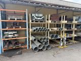 many different types of pipes and pipes in a warehouse