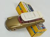 a toy car with a box on the back of it