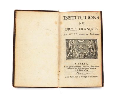 an open book with a picture of a man and a woman on it