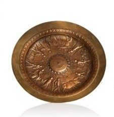 pair of antique brass door knobs on a white background