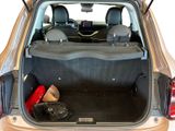 the back of a car with its trunk open and luggage in the trunk