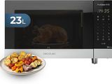 a plate of vegetables on a plate in front of a microwave