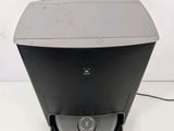 an image of a black and silver printer sitting on top of a white surface