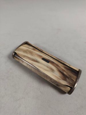a lighter that is sitting on a table