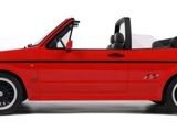 a red convertible car with a black top and black wheels