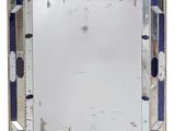 an image of a mirror with blue and white mosaics on it