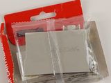 a small package of batteries in a red package