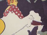 a picture of a woman sitting on a chair with a dog