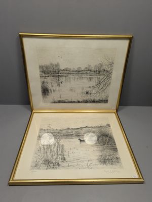 une photo d'une photo d'une photo d'un lac dans un cadre doré