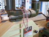 a machine that is sitting on a table in a workshop