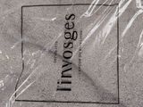a plastic bag that has a logo on it