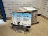 a pile of newspapers sitting on top of a cart