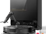 an image of a robotic vacuum cleaner with a remote control
