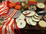 a table with many different types of musical instruments on it
