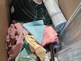 a box full of clothes and other items in it