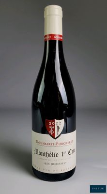 a bottle of wine that is sitting on a table