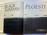 an open book with a picture of a plane flying in the sky