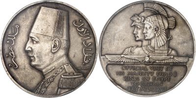 an image of a silver coin with an image of a man in a turban