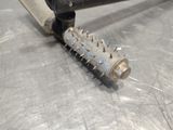 a metal object with spikes on it sitting on a table