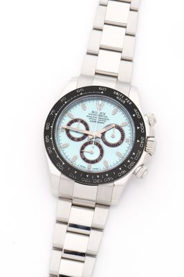 an image of a close up of a wrist watch on a white surface