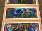 three paintings of people in different colors are on a table