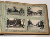 an open book with pictures of people and buildings on it
