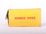 a yellow box with the words dinky toys written on it