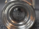 a close up view of a metal object on the ground