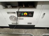 a picture of a machine that is sitting on the ground