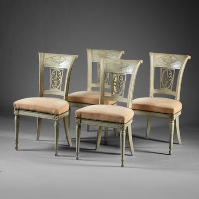 lot de quatre chaises avec dossier et assise rembourrés