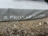 a bag that is sitting on the ground next to a car