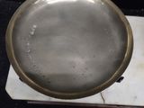 a silver pan sitting on top of a marble counter