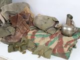 a pile of military items sitting on a table