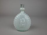 a glass bottle with a picture of a man and a woman on it