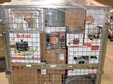 a large metal cage with a bunch of items inside of it