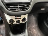 a dashboard of a car with a car radio in the center of it