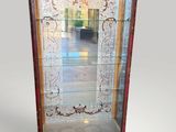 an image of a display case with a mirror in it