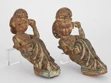 paire de figurines sculptées représentant une femme et un homme