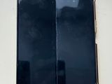 a close up of an open cell phone on a table
