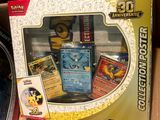 a box of pokemon cards on display in a store