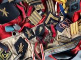 many different types of ties laid out on a table